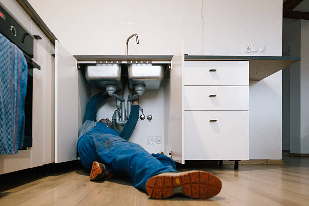 Professional Emergency Plumber technician working in Whitehall, PA